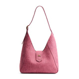 Hollyhock | Structured hobo shoulder bag with floral patterned embossed leather, adjustable strap and magnetic closure