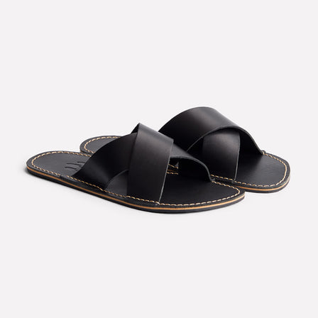 Nero | Flat leather sandals with debossed PLG three tree logo in sole