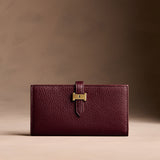 Hunter Large | Leather bifold wallet with a strap and bar closure