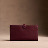 Hunter Large | Leather bifold wallet with a strap and bar closure