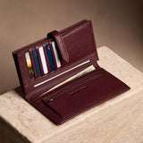 Hunter Large | Leather bifold wallet with a strap and bar closure