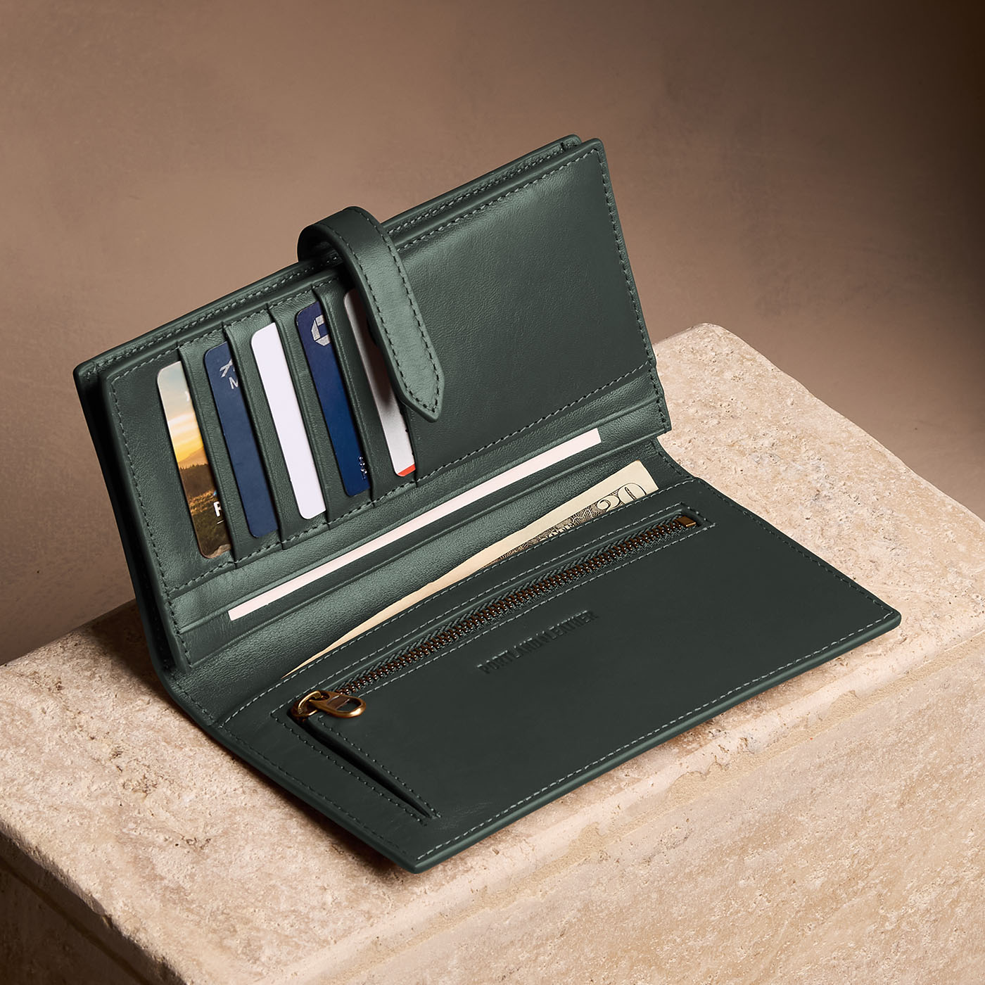 Regent Green*Large | Leather bifold wallet with a strap and bar closure