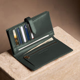 Regent Green Large | Leather bifold wallet with a strap and bar closure
