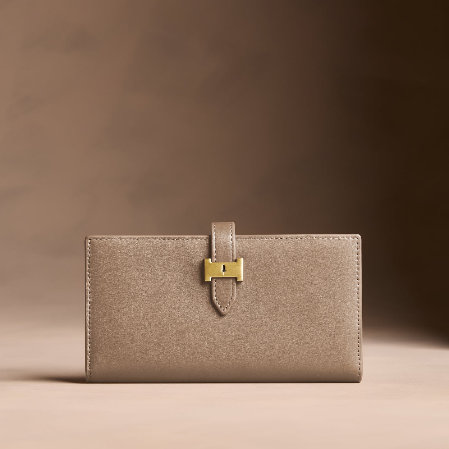 Satine*Large | Leather bifold wallet with a strap and bar closure