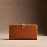 Vintage Tan Large | Leather bifold wallet with a strap and bar closure