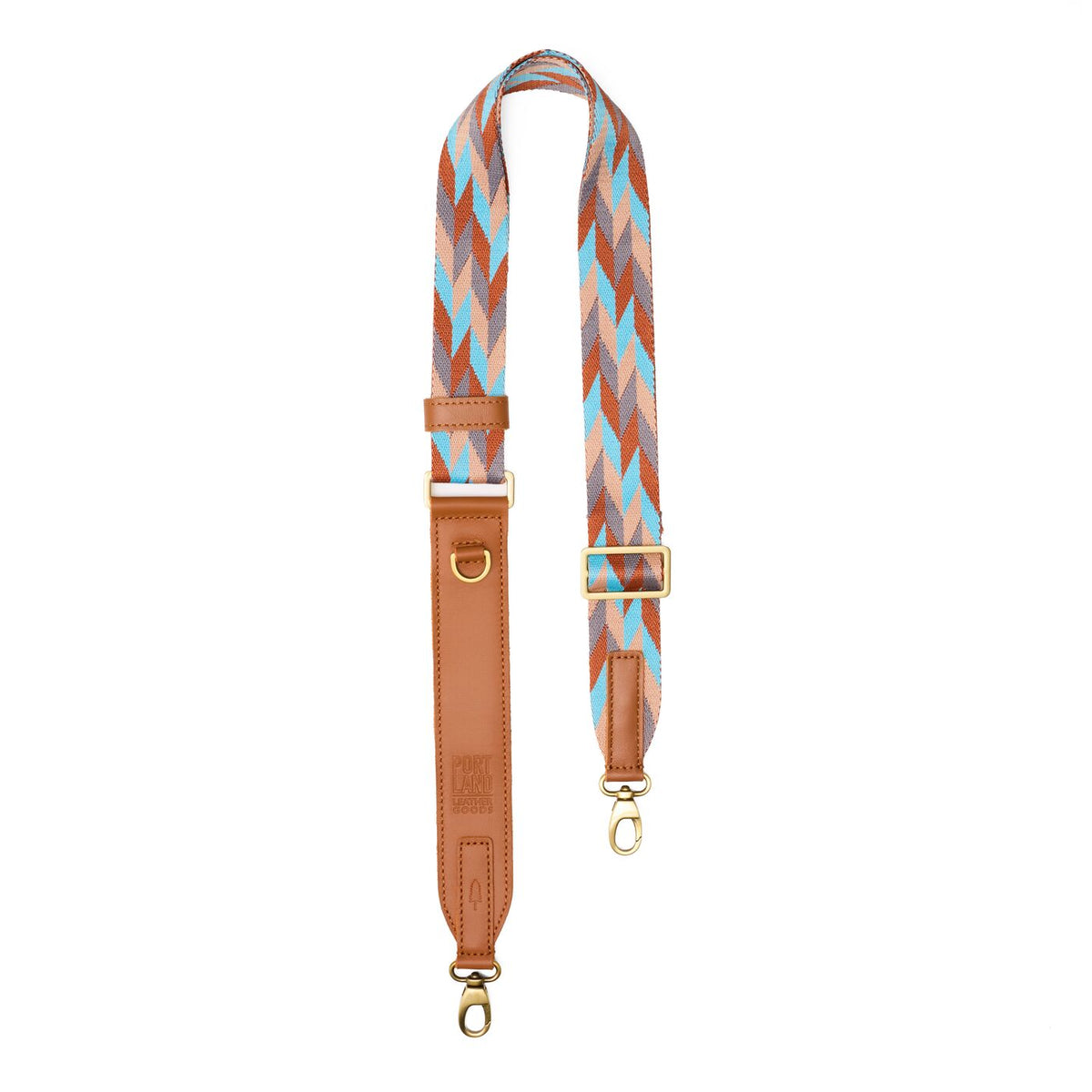Driftwood | Patterned fabric and leather strap on a white background