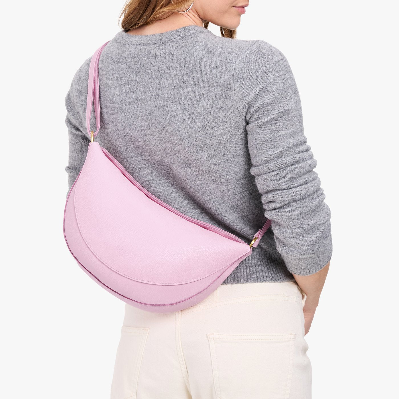 Pinkaboo*Large | Model wearing half circle shaped sling bag