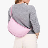 Pinkaboo Large | Model wearing half circle shaped sling bag