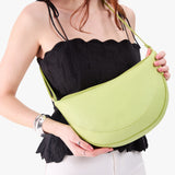 Shadow Lime Large  Model wearing half circle shaped sling bag