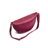 Half circle shaped sling bag