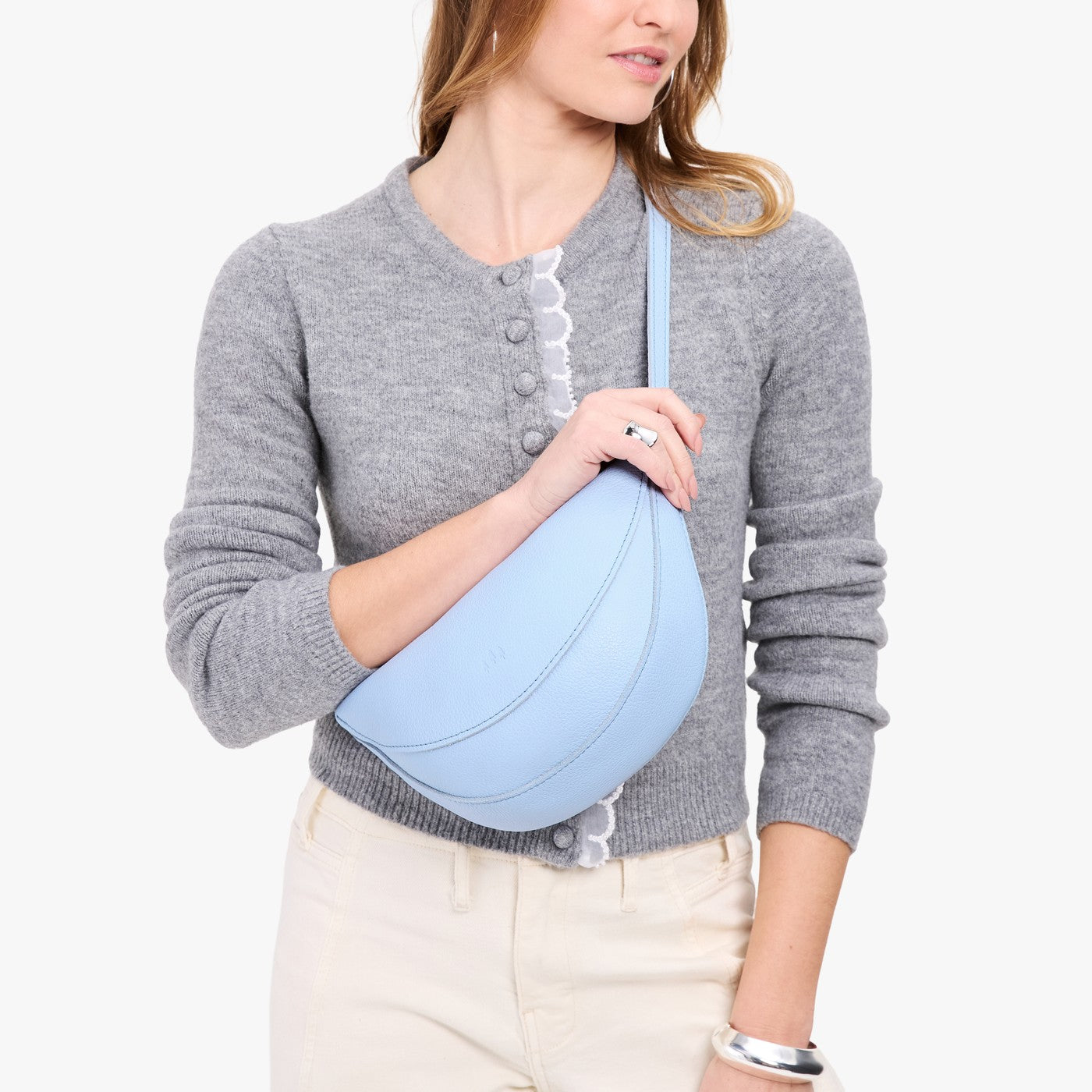 Skyway*Medium | Model wearing half circle shaped sling bag