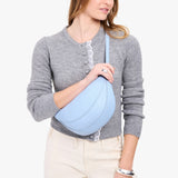 Skyway Medium | Model wearing half circle shaped sling bag