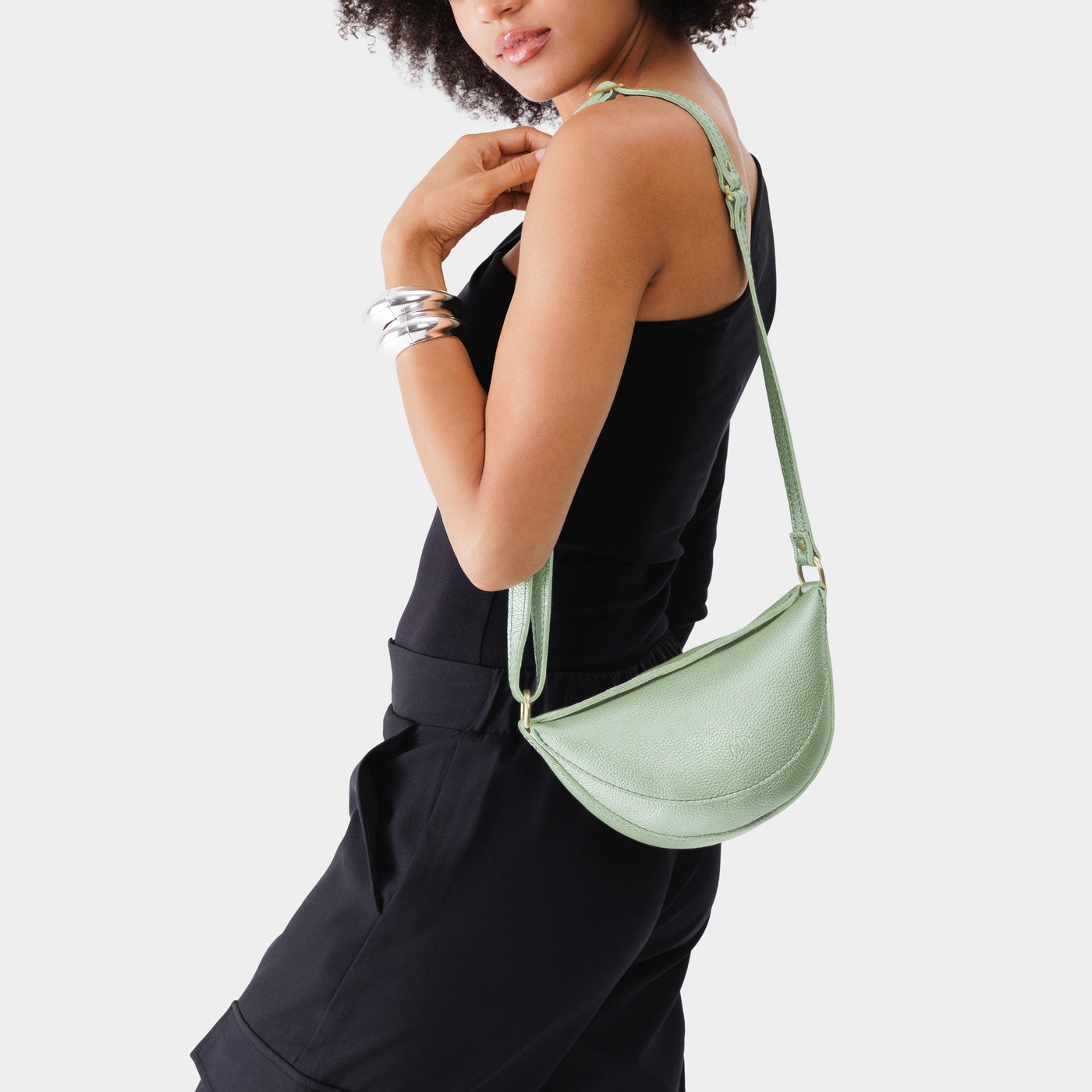 Beetle*Small | Model wearing half circle shaped sling bag