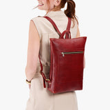 Chili Red | Model wearing rectangular slim leather laptop backpack