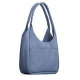 Denim Large | U-shaped, flat-bottomed leather shoulder bag with two outside pockets
