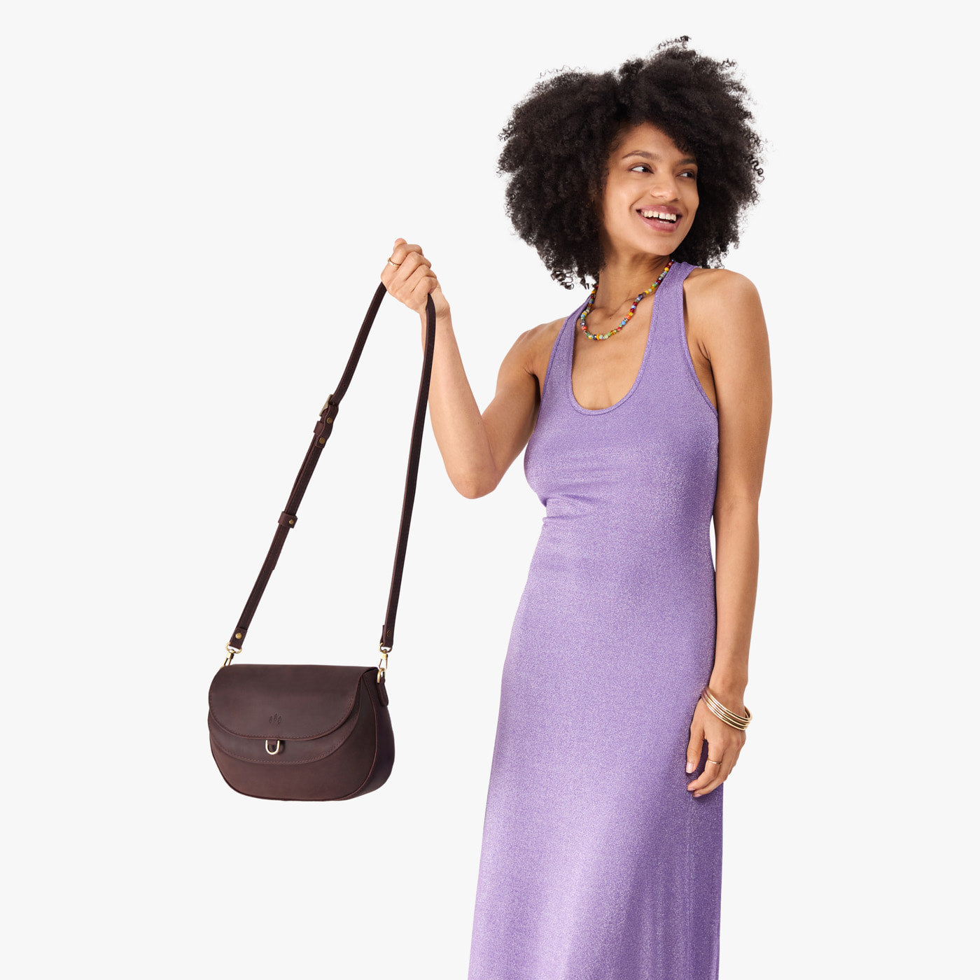 Moose*Large | Model wearing a leather Crossbody with a flap and magnetic closure