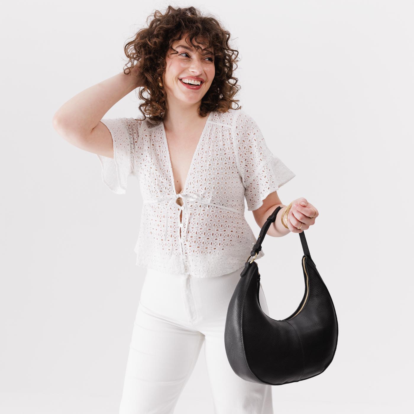 Pebbled--black*Large  | Large crescent shaped shoulder bag with zipper closure and adjustable strap