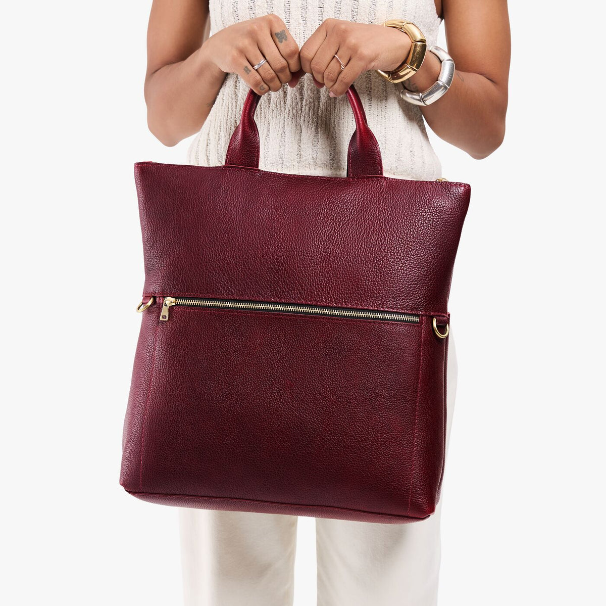 Cabernet*Large | Model wearing a convertible tote clutch crossbody