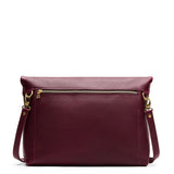 Cabernet Large | Convertible tote clutch crossbody with a back zipper pocket folded into a clutch