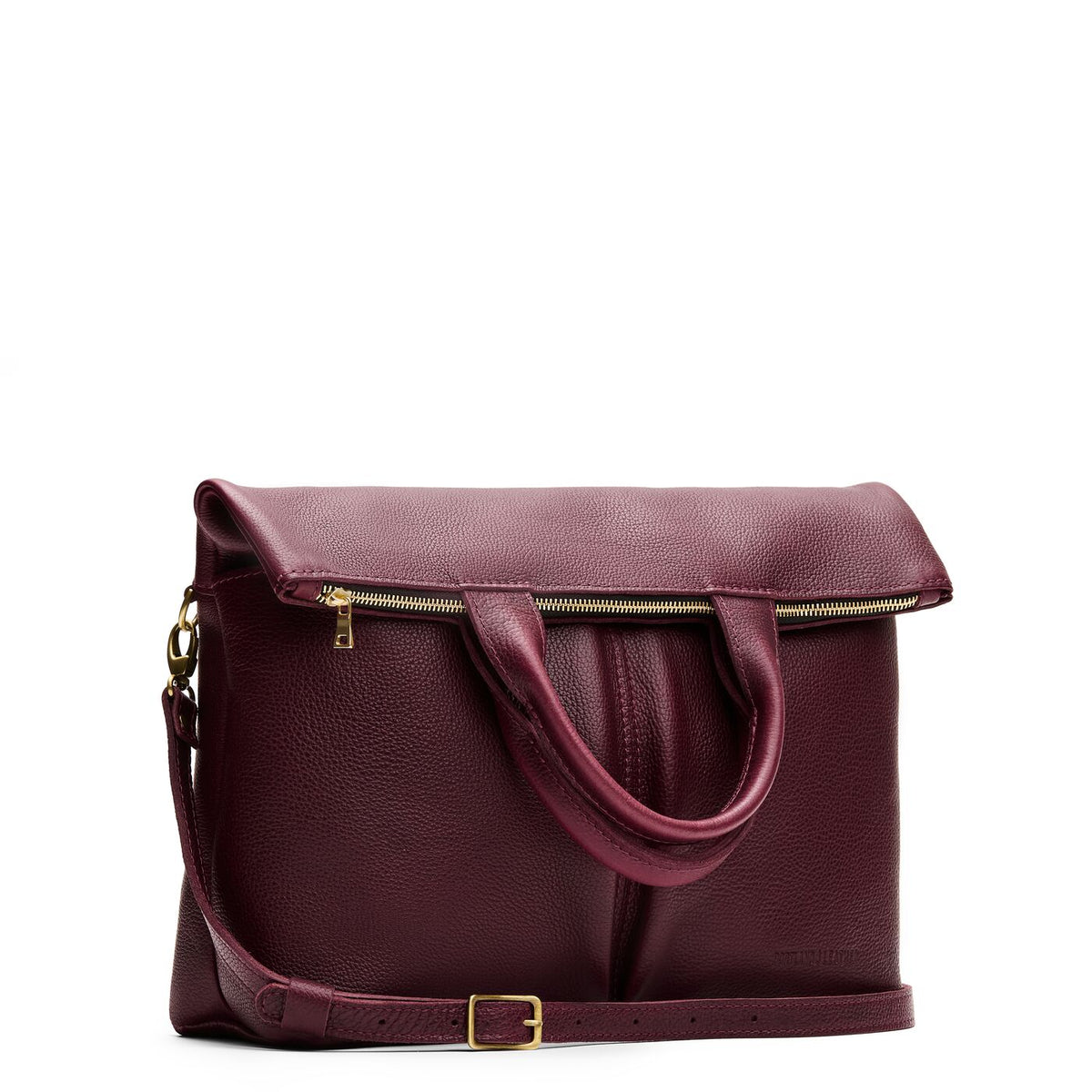 Cabernet*Large | Convertible tote clutch crossbody with two large front pocket and top carry handles folded into a clutch