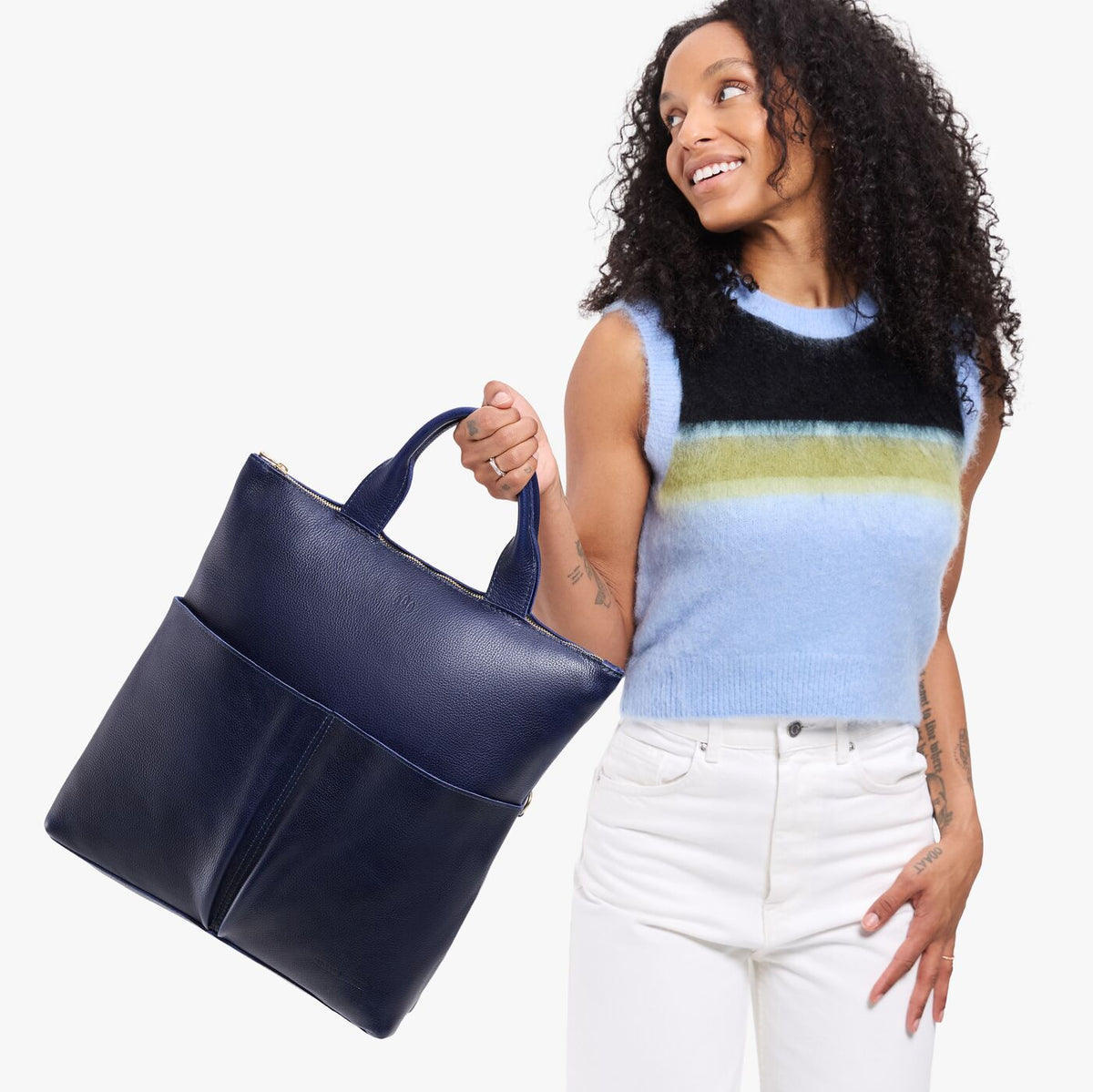 Cobalt*Large | Model wearing a convertible tote clutch crossbody