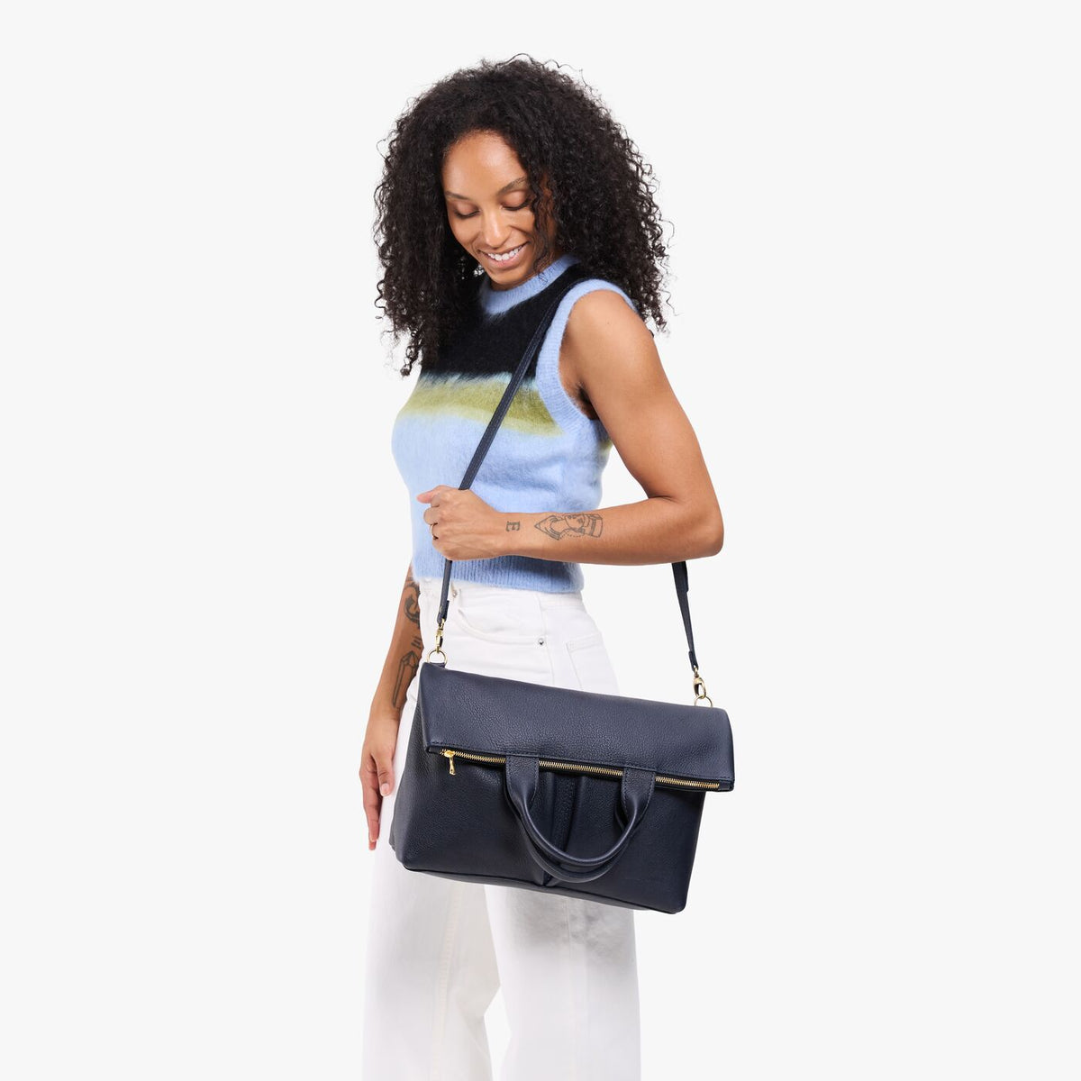 Night Owl*Large | Model wearing a convertible tote clutch crossbody