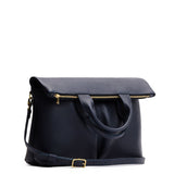 Night Owl Large | Convertible tote clutch crossbody with two large front pocket and top carry handles folded into a clutch