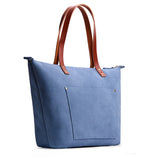 Denim Zipper | Large leather tote bag with sturdy bridle handles and front pocket