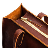 Nutmeg East/West | Structured wide tote bag with overlapping panels and crossbody strap