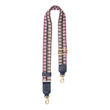 Berry Matcha | Patterned fabric and leather strap on a white background 