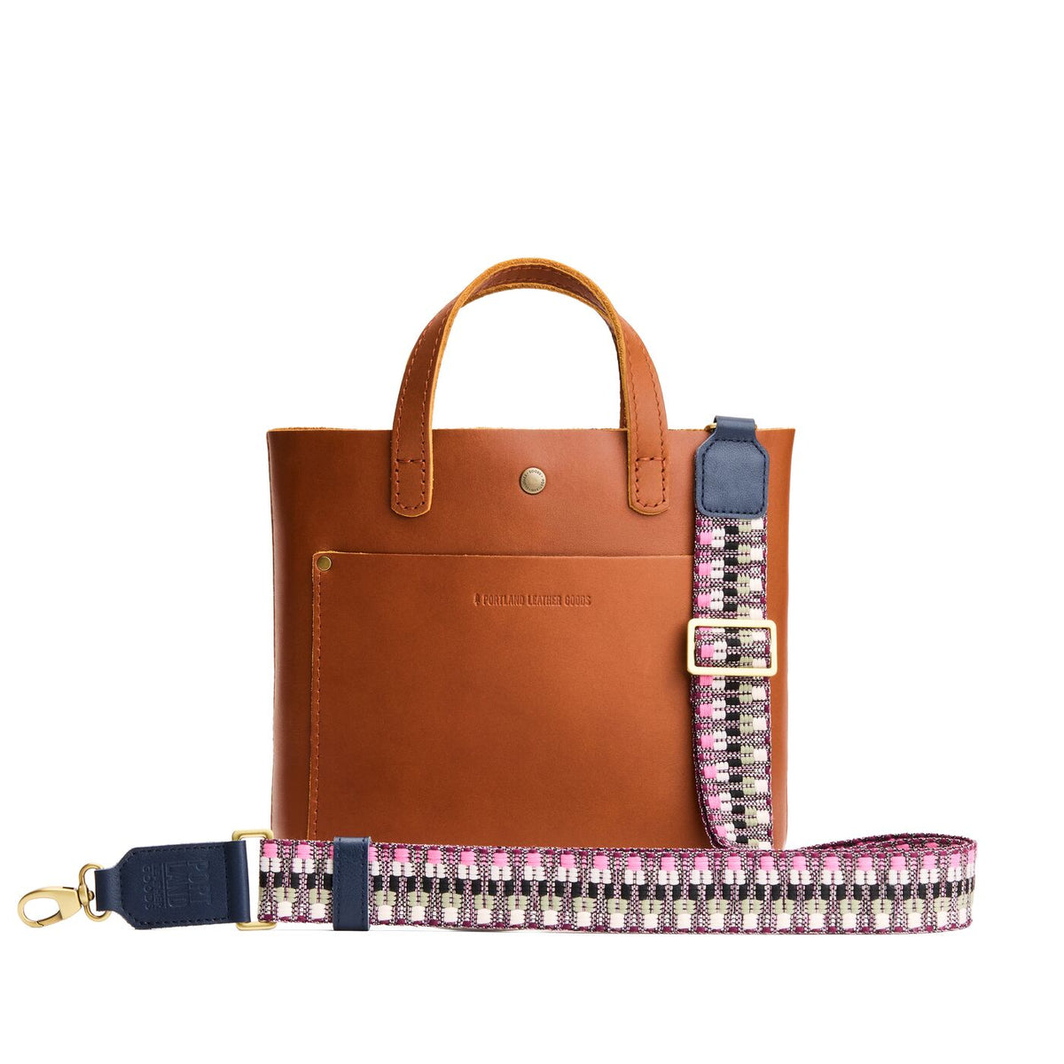 Berry Matcha | Patterned fabric and leather strap on a white background 