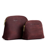 Merlot | Comparison view of compact leather pouches with top zippers