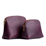 All Color: Plum | Comparison view of compact leather pouches with top zippers
