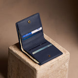 Anchor Blue Small | Petite slim leather bifold wallet with multiple card slots and a zippered back pocket