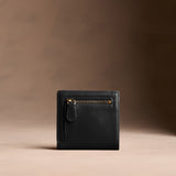 Onyx Small | Petite slim leather bifold wallet with multiple card slots and a zippered back pocket - back view