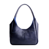 Cobalt Medium | U-shaped, flat-bottomed leather shoulder bag with two outside pockets