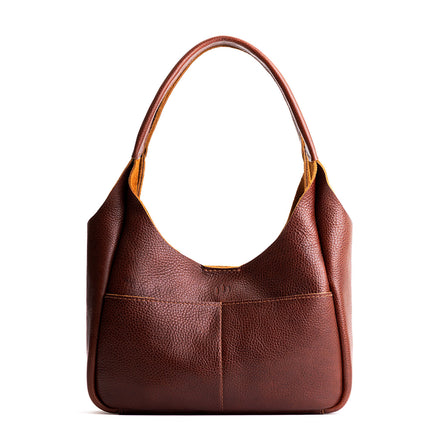 Nutmeg*Large | U-shaped, flat-bottomed leather shoulder bag with two outside pockets