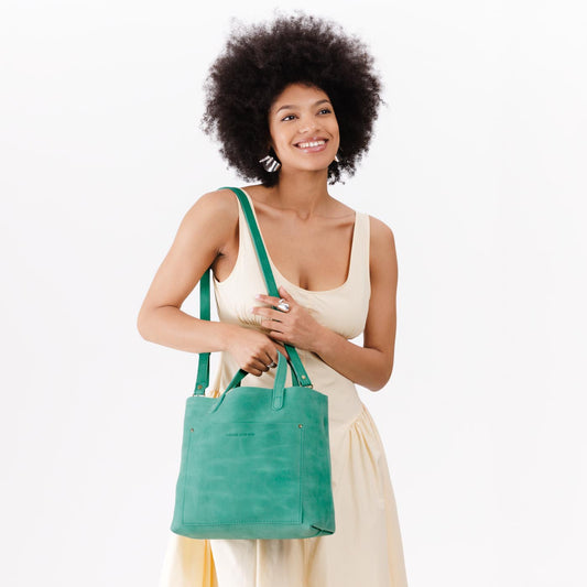 Reef | Midsize crossbody tote with handles and a pocket