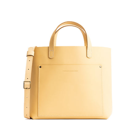 Vanilla*Zipper | Midsize crossbody tote with handles and a pocket