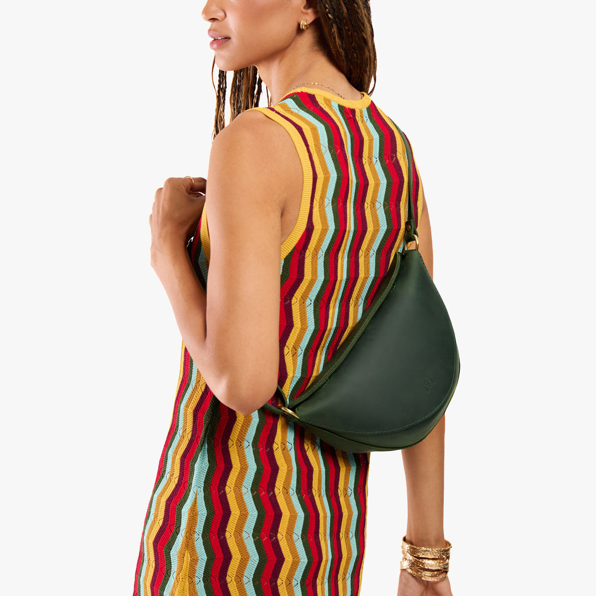 Evergreen*Medium | Model wearing petite half circle shaped sling bag