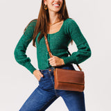 Honey Medium | Model Wearing Leather Crossbody Bag with Magnetic Messenger Bag Closure