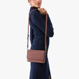 Sunkissed Mini | Model Wearing Small Leather Crossbody Bag with Magnetic Messenger Bag Closure