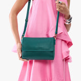 Sea Glass Medium | Model Wearing Leather Crossbody Bag with Magnetic Messenger Bag Closure