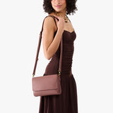 Sunkissed Medium | Model Wearing Leather Crossbody Bag with Magnetic Messenger Bag Closure