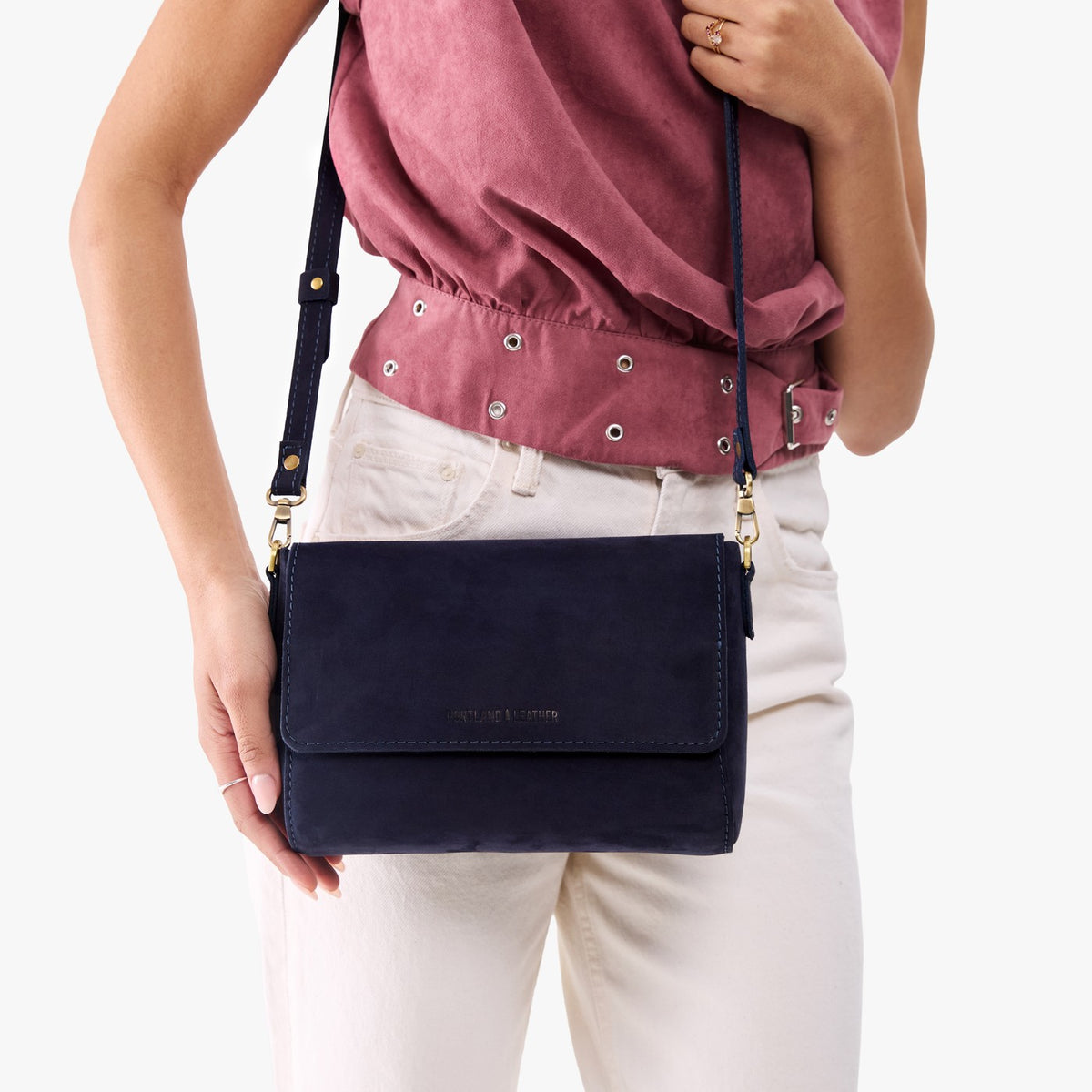 Velvet Blue*Medium | Model Holding Leather Crossbody Bag with Magnetic Messenger Bag Closure