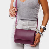 Lollipop Mini | Model Wearing Small Leather Crossbody Bag with Magnetic Messenger Bag Closure