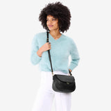 Black Large | Model wearing a leather Crossbody with a flap and magnetic closure