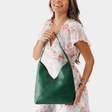Bacalar Large | Model wearing mid-size shoulder bag with magnetic snap closure