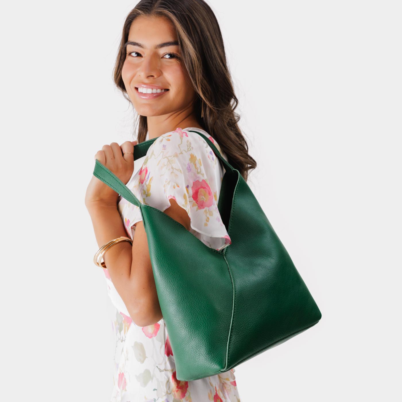 Bacalar*Large | Model wearing mid-size shoulder bag with magnetic snap closure