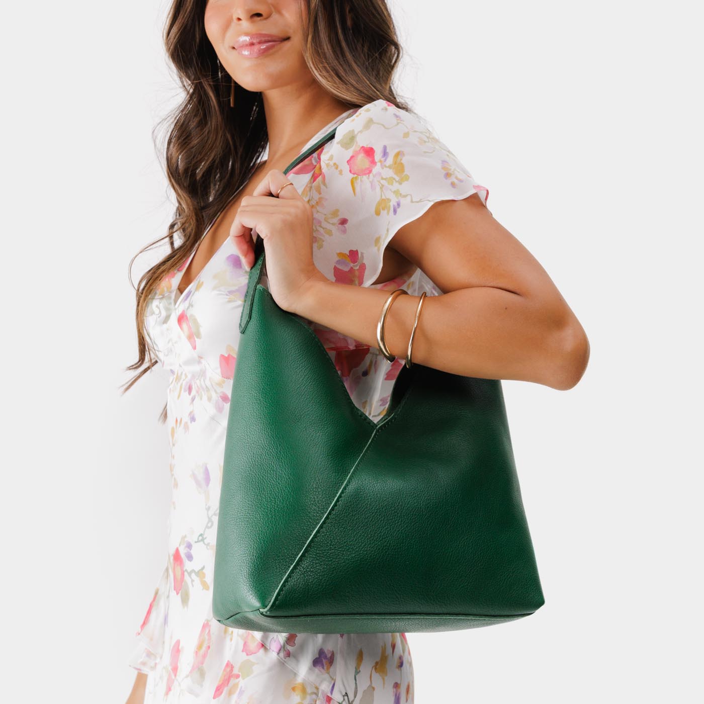 Bacalar*Large | Model wearing mid-size shoulder bag with magnetic snap closure